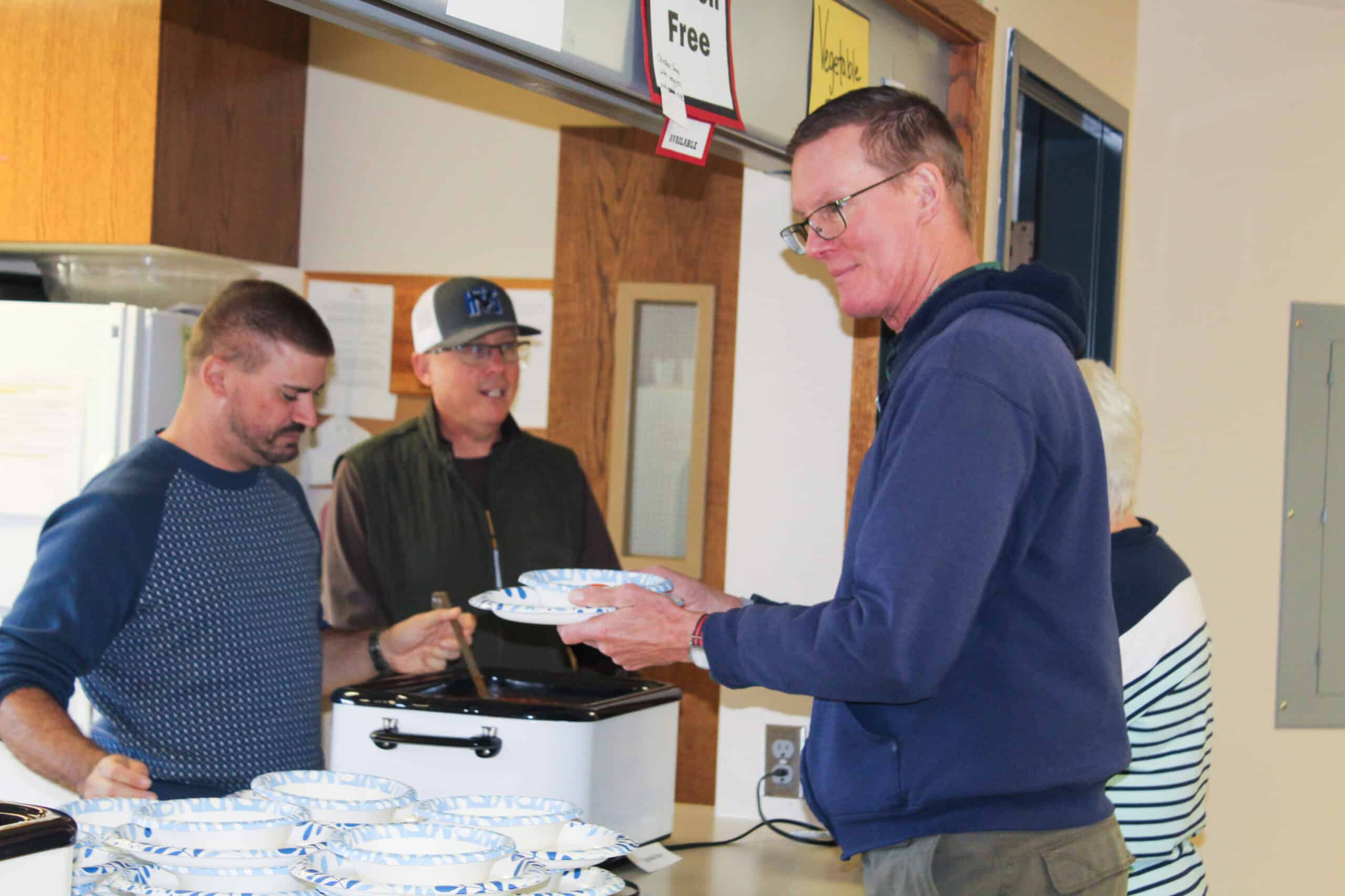 Serving soup at the yearly Holiday Bazaar at Peace With Christ Lutheran Church ChristLife group photo in Fort Collins, CO