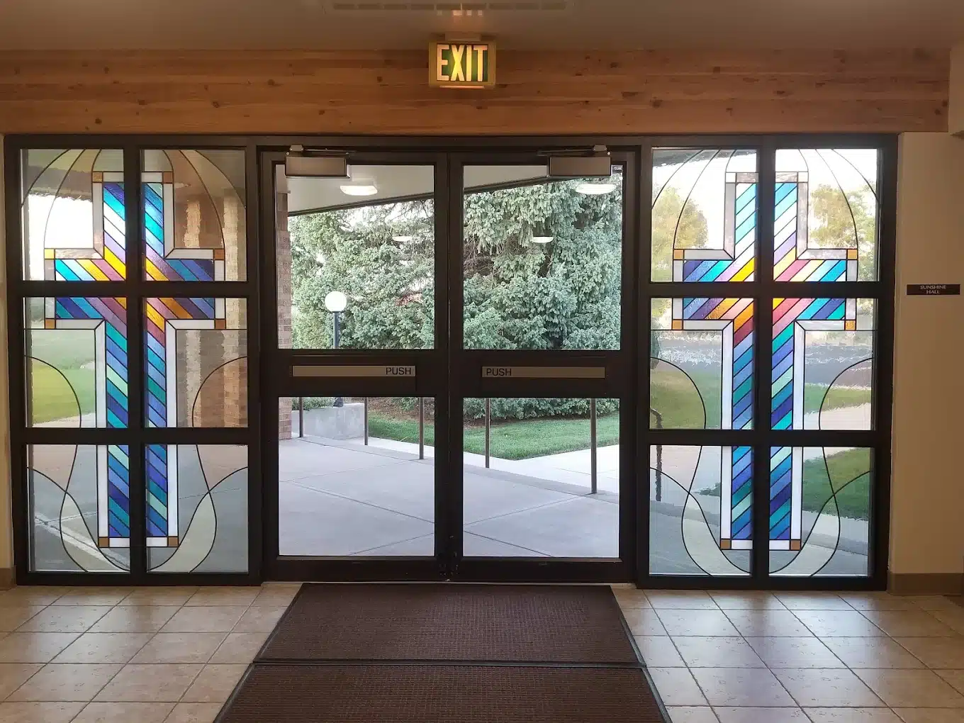Front doors of Peace With Christ Lutheran Church, welcoming people year round and on Christmas