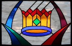 Stained glass window featuring a royal crown