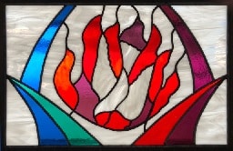 Stained glass window depicting the Holy Spirit as a dove