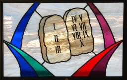 Stained glass window showing the Ten Commandments tablets